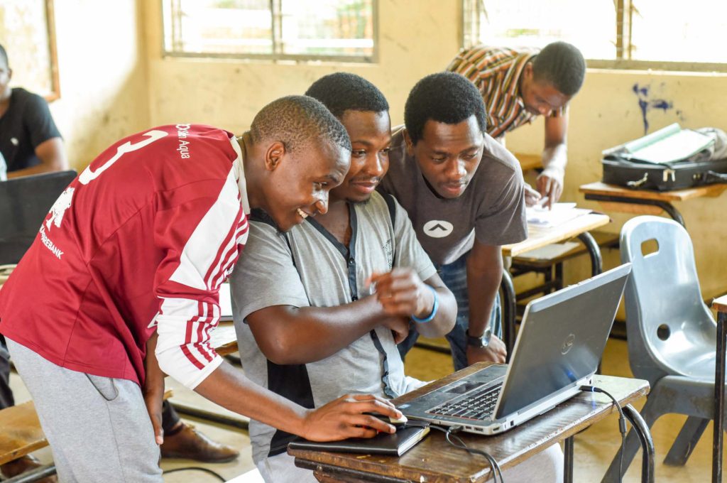 Students interact during a class at Ace College of Media and Design
